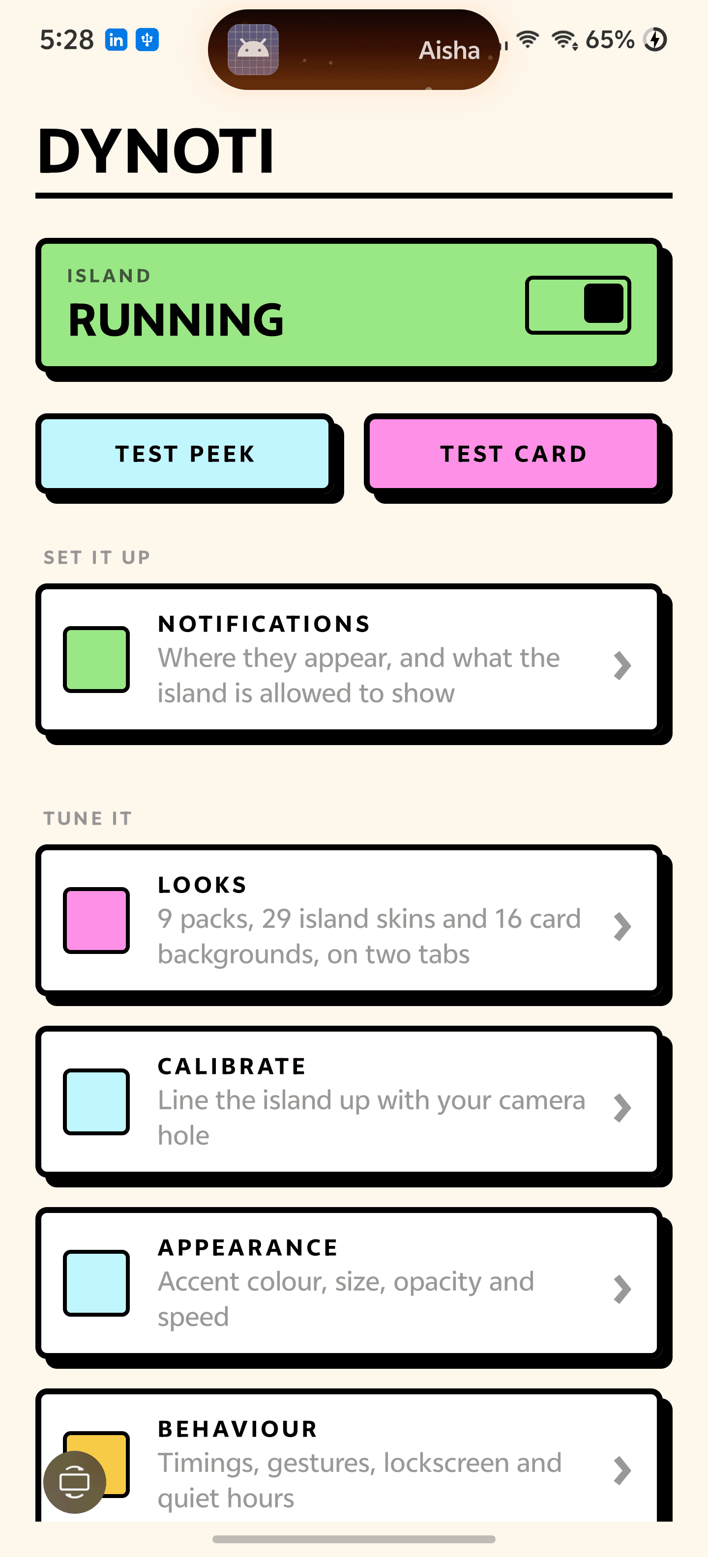 The island at the top of the screen showing an incoming notification